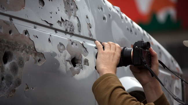 Расстрелянная машина и полиция: что происходит возле МОСТ-Сити